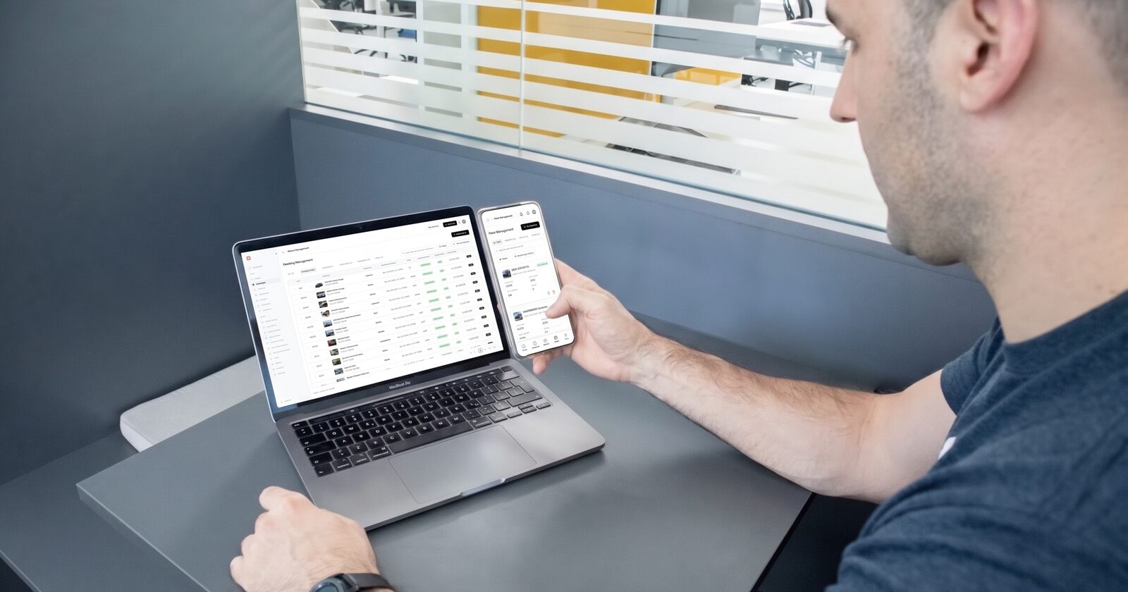 Small fleet operator reviewing car rental software options on a laptop